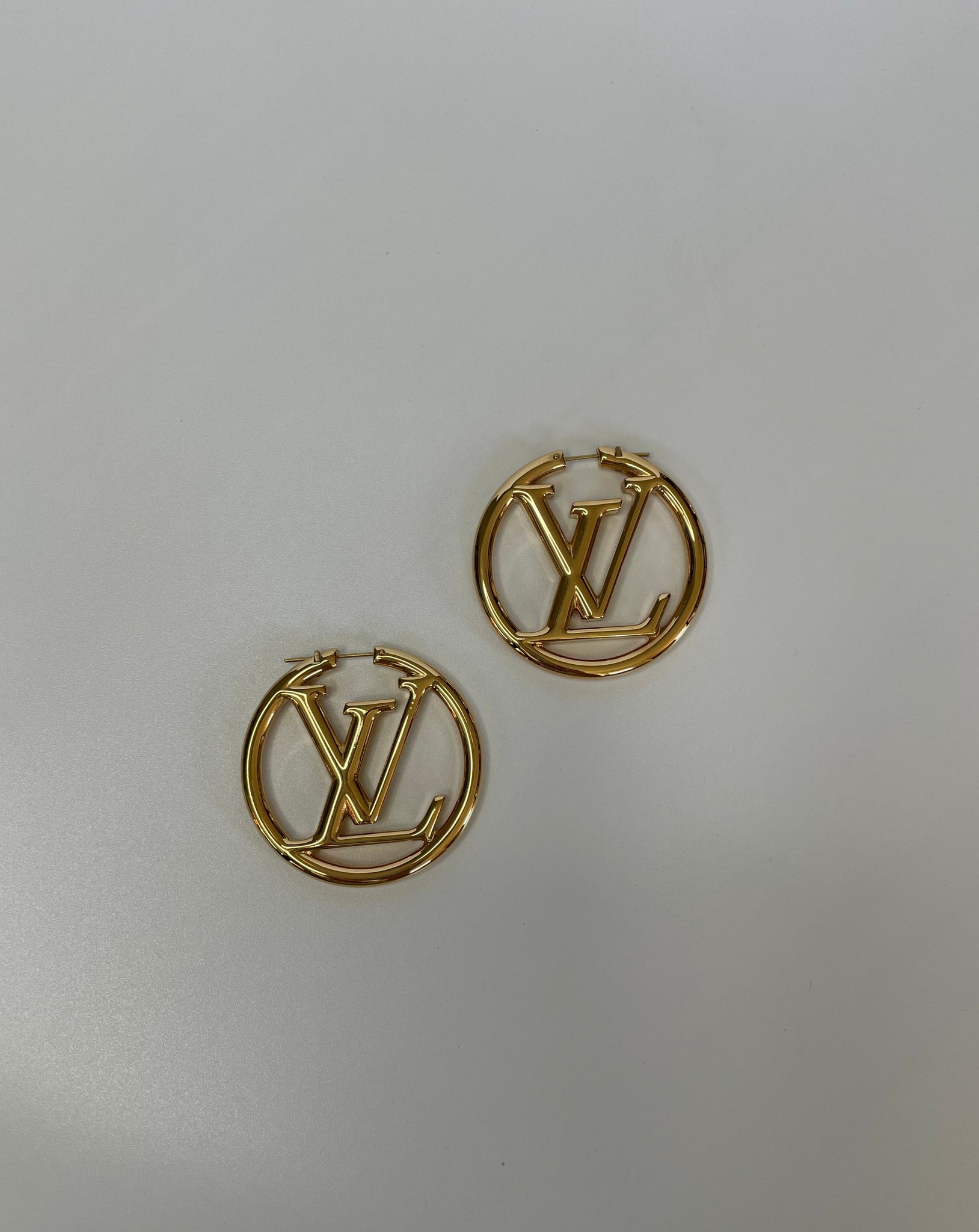 Louise earrings Louis Vuitton Silver in Metal - 34479684