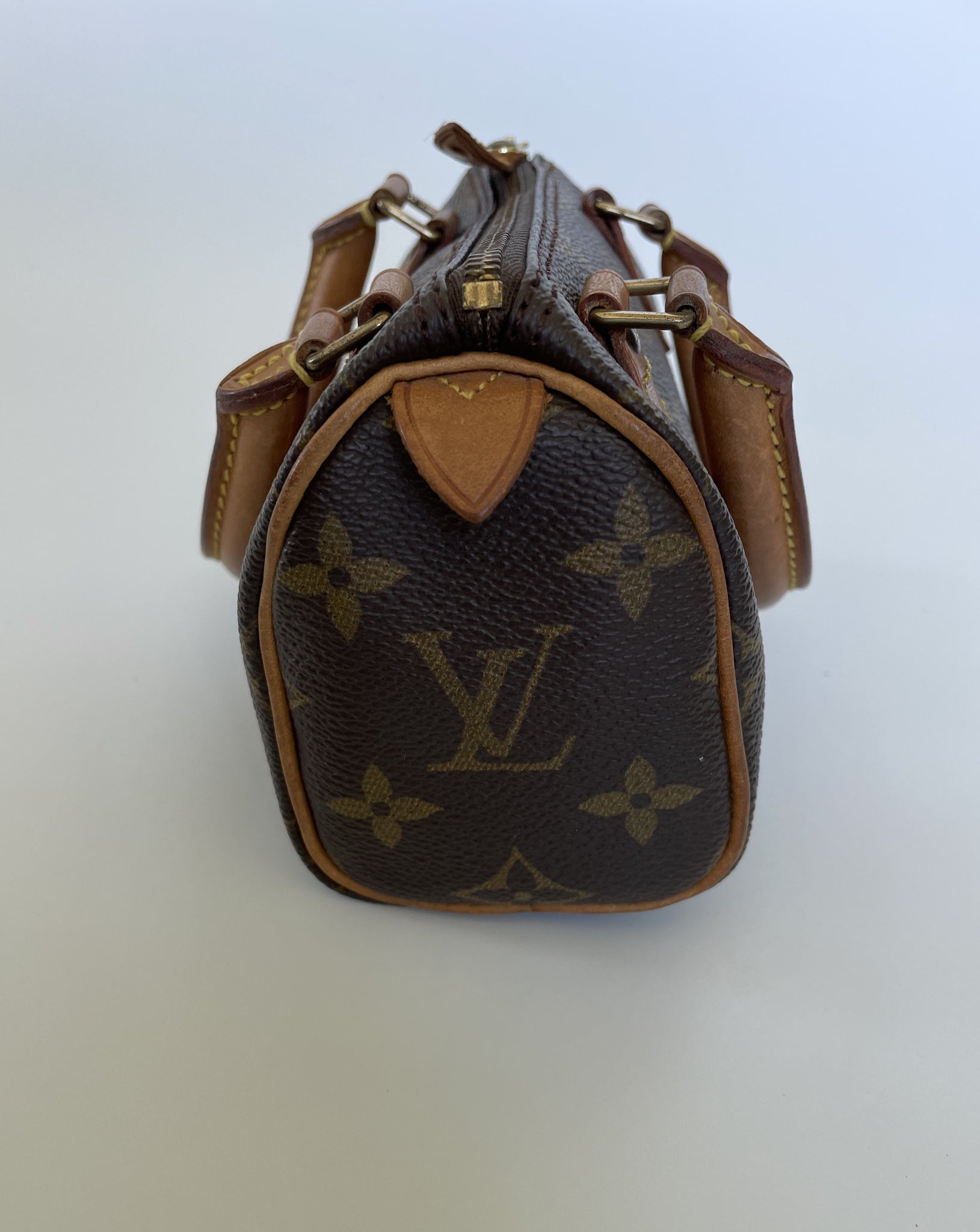 A Louis Vuitton Monogram Mini Speedy